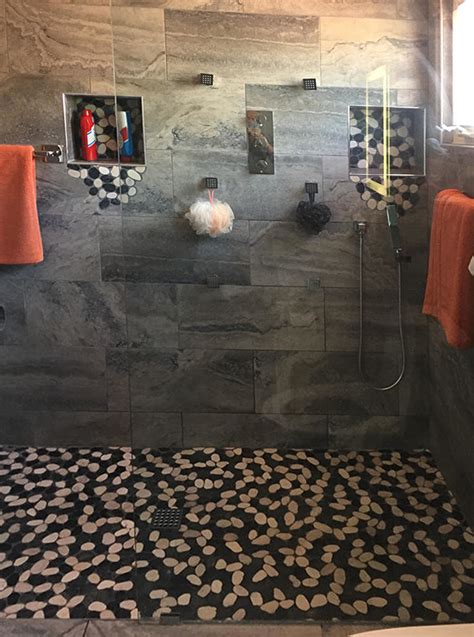 Sliced Black And White Pebble Tile Shower Floor And Niche Pebble Tile