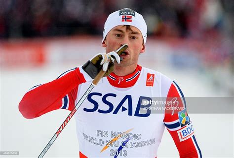 Norways Petter Northug Reacts At The Finish Line After The Mens