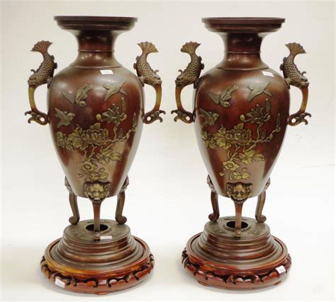 Japanese Meiji Bronze Vases With Fish Handles And In Relief Decoration