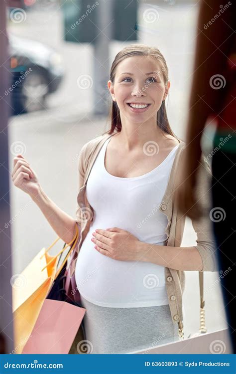 Happy Pregnant Woman With Shopping Bags At City Stock Image Image Of