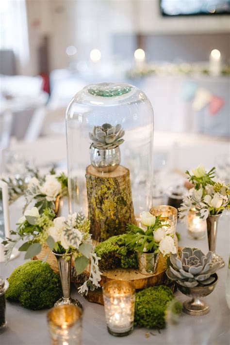 Picture Of A Glam Woodland Wedding Centerpiece With Moss