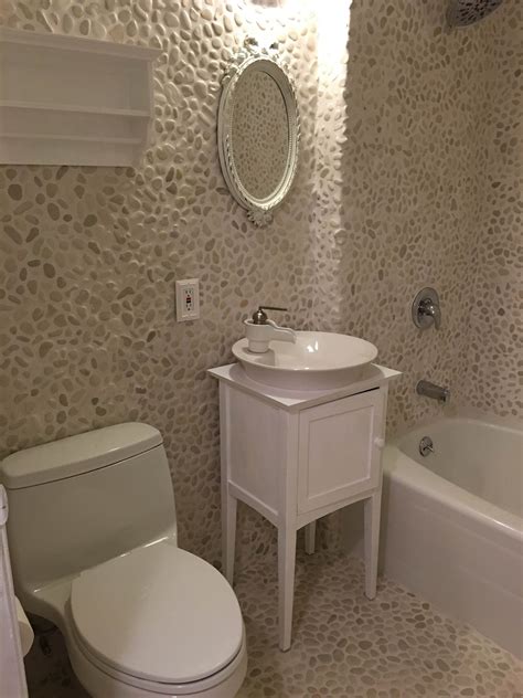 White Pebble Tile Tile Bathroom Small Bathroom Remodel Bathroom