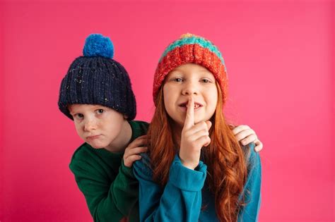 Free Photo Little Children Isolated Showing Silence Gesture