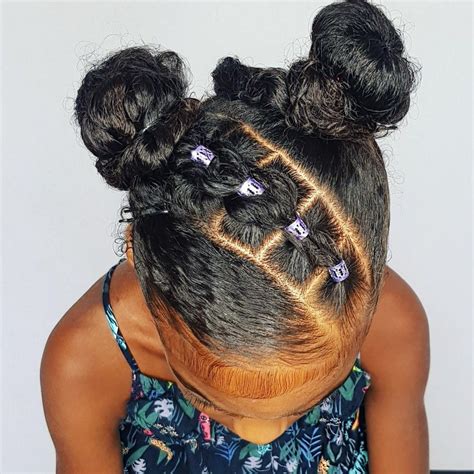 Buns With Pull Through Braids Hairstyle For Curly Little