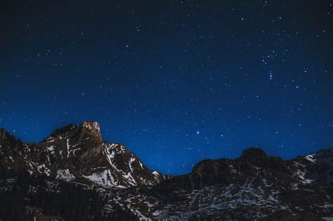 Royalty Free Photo Snow Covered Mountains At Night With