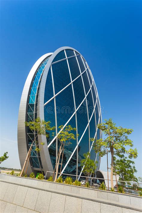 The Aldar Headquarters Building Stock Photo Image Of Aldar Sunset