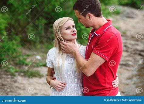Couple In Love Blonde Girl And Guy On The River Bank Stock Image Image Of Shore Blonde 268430075