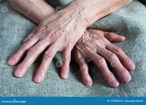 Working Wrinkled Hands Of An Old Woman Royalty Free Stock Photo