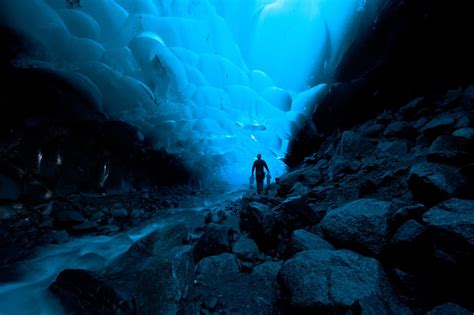 Exploring An Ice Cave Beneath Mendenhall Glacier In Juneau Alaska