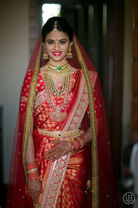 If so, here's 15 bridal shower gift ideas perfect for the modern bride! Photo of South Indian bridal look in red saree with dupatta