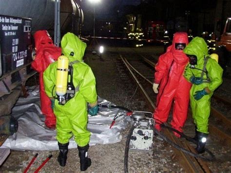 Guys In Level A Hazmat Suits Photo