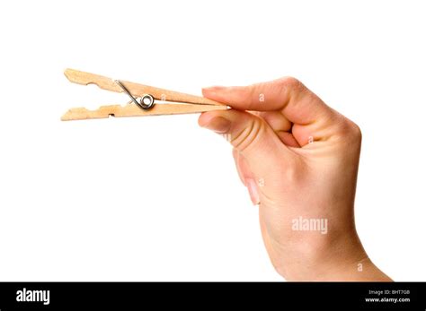 Hand Holding Clothes Pin Stock Photo Royalty Free Image 28192315 Alamy