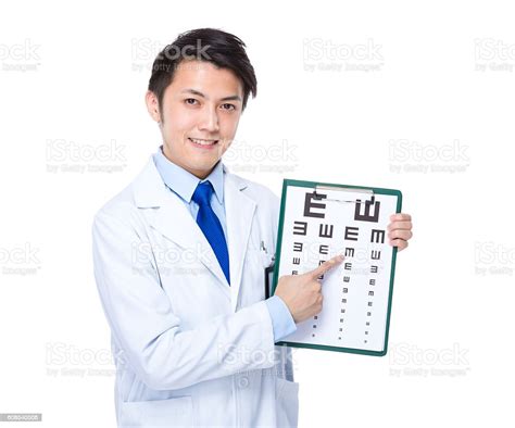 Optometrist Pointing At An Eye Chart Stock Photo Download Image Now