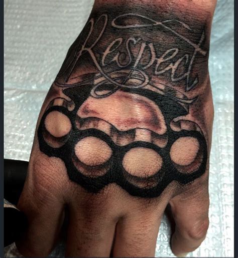 Brass Knuckle Hand Tattoo By Audrey Mello Hand Tattoos Knuckle