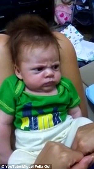 Grumpy Mexican Toddler Refuses To Smile For Parents And Frowns At Them