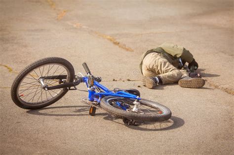 Child Fell Off Bicycle Stock Photos Free And Royalty Free Stock Photos
