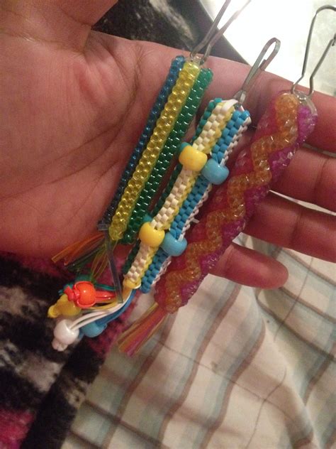 You know that colorful plastic string stuff you made keychains and bracelets with during summer camp? Fluted columns | Lanyard crafts, Plastic lace, Beaded bracelets