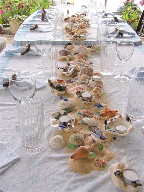 Beach decorations and beach wedding centerpieces demonstrate the colours and motifs of the sea. Beach Theme Table Decorations | An Inspired Kitchen