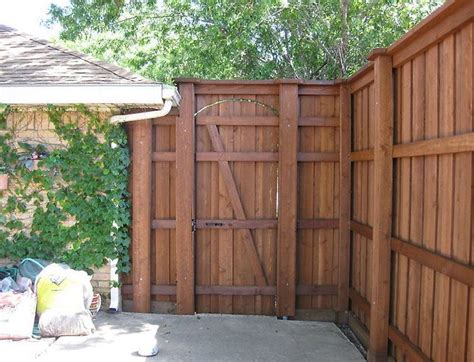 Outdoor living space Austin | Wood fence, Iron fence, Outdoor living space