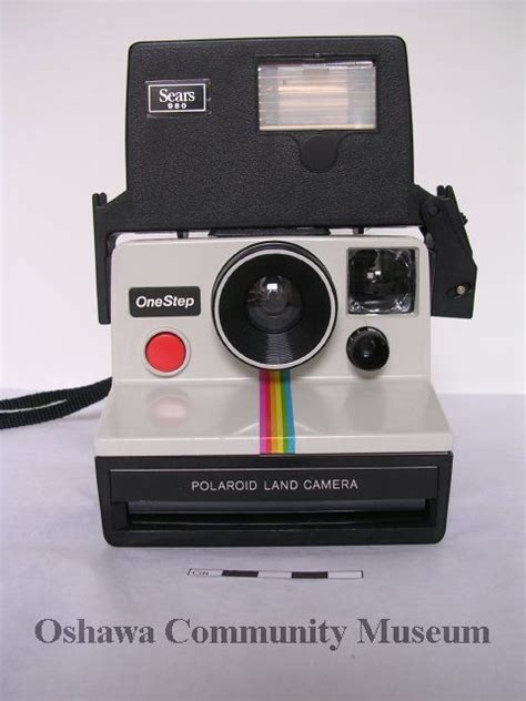 Polaroid One Step Land Camera And Sears 980 Detachable Flash The