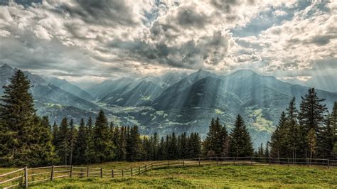 Picture Rays Of Light Alps Austria Nature Mountain Fence 2560x1440