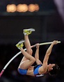 Stacy Dragila takes the inaugural gold medal in women's pole vaulting ...