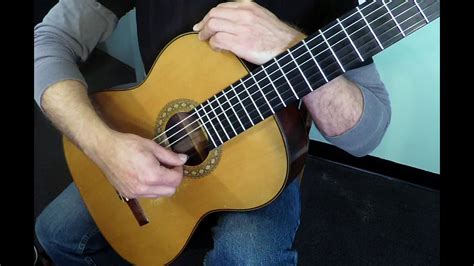 Good write up on how holding a guitar is actually supposed to go. Lesson 1, Part 2: Right Hand Position for Classical Guitar ...