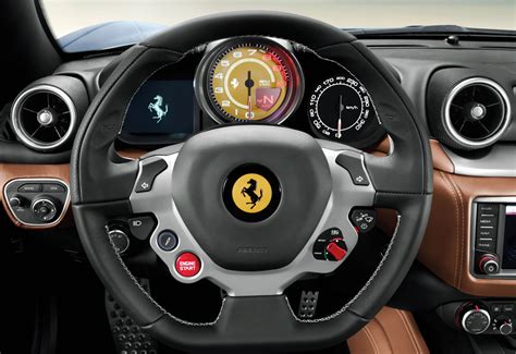 We wondered what sort of controls could be retrofitted to the steering wheels of more everyday cars. Ferrari California T Interior - Steering Wheel - Car Body Design