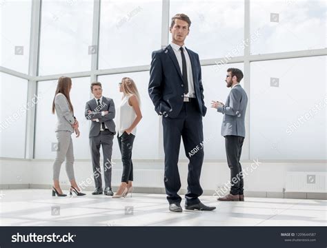 Bottom Nfident Businessman Standing In A Spacious Hallconfident