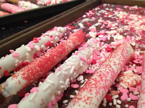 White Chocolate Dipped Pretzel Rods With Sprinkles Valentines Theme