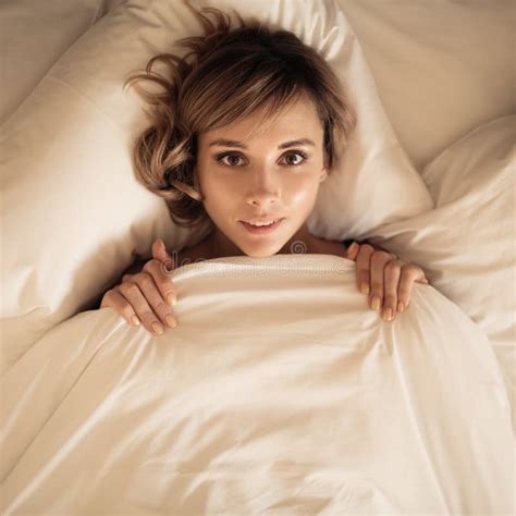 Young Cute Woman Lying In Bed Top View Stock Image Image Of Adult Pillow 128893767