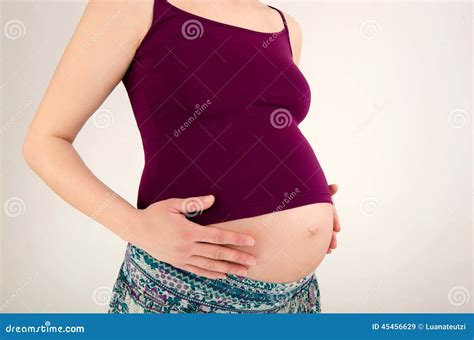 Close Up On Woman Holing Her Pregnant Belly Stock Image Image Of Caucasian Clothes 45456629
