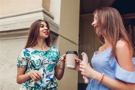 Beautiful Young Women Drinking Coffee At Cafe Stock Photo Image Of