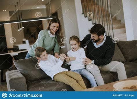 siblings fighting over tv remote control at home stock image image of