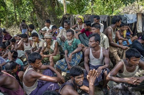 rohingya muslims fleeing myanmar watch homes burn cbs news