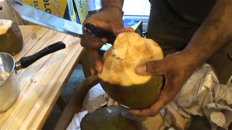 How To Cut Open Young Green Coconuts Without Losing Your Fingers