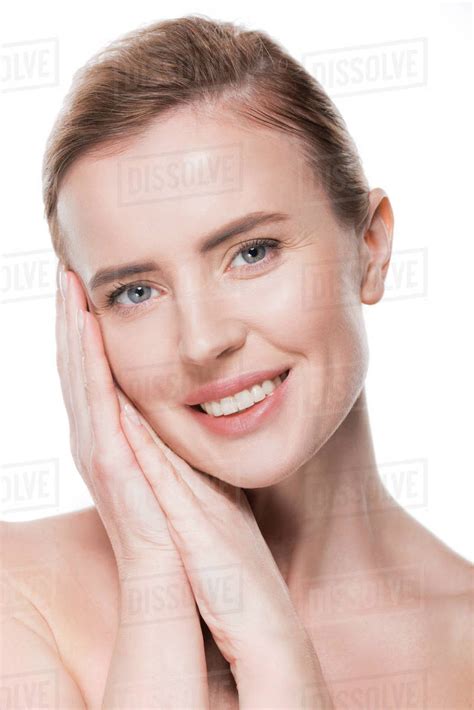 Portrait Of Female With Clean Skin Touching Own Face Isolated On White