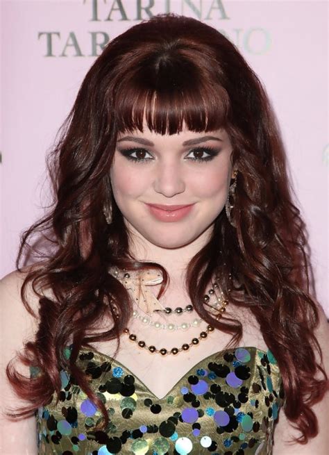 Long Red Curly Hairstyle With Blunt Bangs From Jennifer Stone