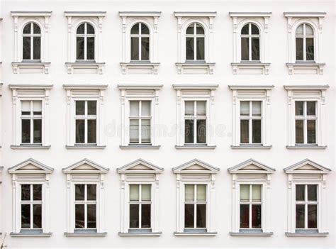 Rows Of Windows On White Facade Of The Building Architectural