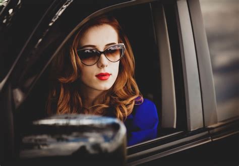 Premium Photo Beautiful Redhead Woman In The Car