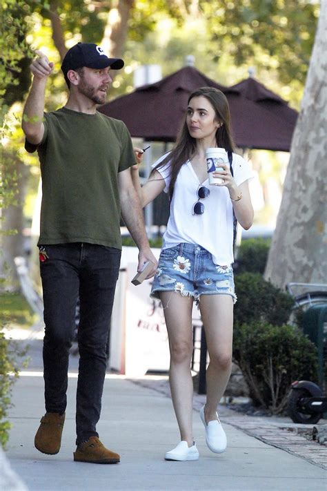 Lily Collins And New Boyfriend Charlie Mcdowell Wrap Arms Around Each