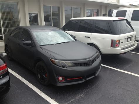 Everyone knows that getting some rims for your toyota camry is the easiest and most effective way to make it stand out from the sea of stockers on the road. 2012 Toyota Camry matte black wrap with black rims | Yelp