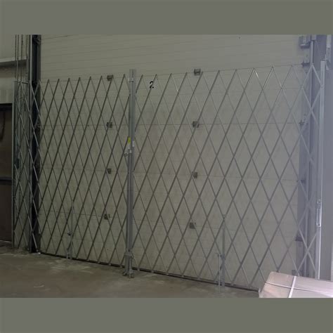 Heavy Duty Pair Folding Security Gates Barron Equipment And Overhead Doors