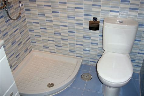 Cuarto de baño estilo retro de color azul marino. Foto: Baño Azul de Reformas Miguel #351067 - Habitissimo