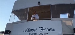 Joe Manchin leans over deck of his yacht to tell protesters why he’ll ...