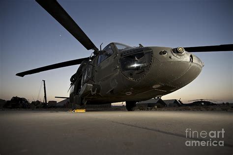 A Uh 60l Blackhawk Parked On Its Pad Photograph By Terry Moore Pixels