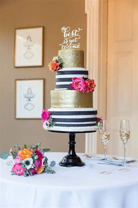 Black and white wedding cakes are never go out of style. Whimsical Black & White Striped Wedding! | Pizzazzerie