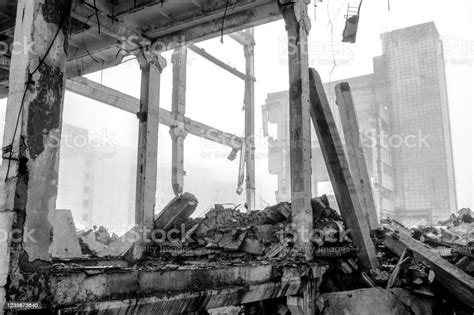 Black And White Image The Destroyed Big Concrete Building In A Foggy