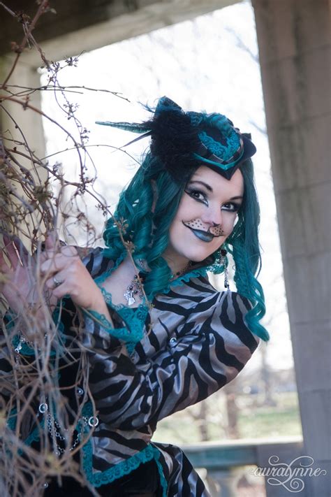The steps are simple, start with a base cheshire cat set, add some crazy eyes and you will be the wisest creature in wonderland! Cheshire Cat Costume - We're all Mad Here | auralynne