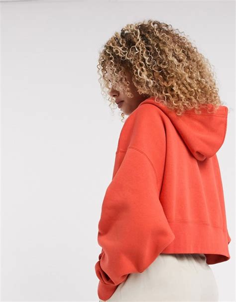 Nike women's grey sportswear essential cropped hoodie. أناقة سريعون تراكم nike red zip up - baytknadeek.com